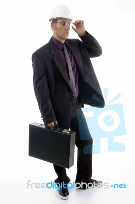 Male Architect In Helmet Holding Office Bag Stock Photo