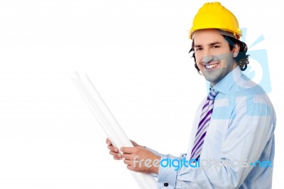 Male Architect With Construction Plan Stock Photo