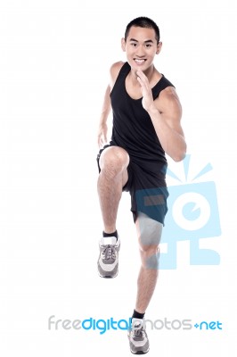 Male Athlete Running Stock Photo