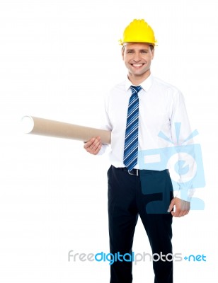 Male Builder Holding Blueprints Stock Photo