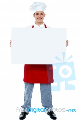 Male Chef Holding Blank Board Stock Photo