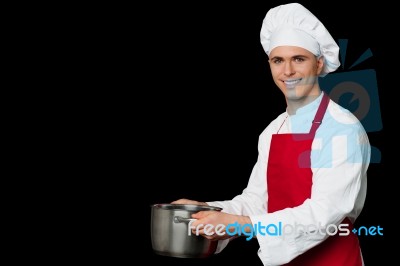 Male Chef Holding Empty Vessels Stock Photo