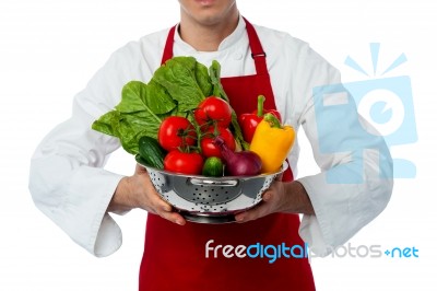 Male Chef Holding Vegetables Bowl Stock Photo