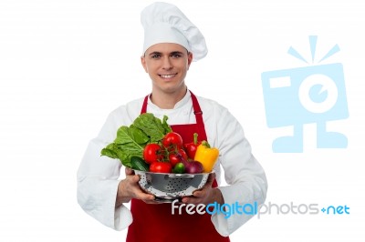 Male Chef Holding Vegetables Bowl Stock Photo