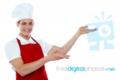 Male Chef Showing Introduce Gesture Stock Photo