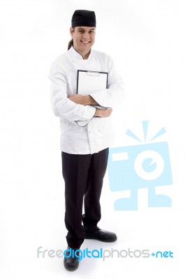 Male Chef Standing With Clipboard Stock Photo