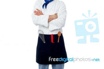 Male Chef With Kitchen Utensils Stock Photo