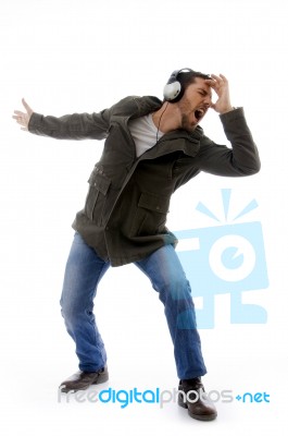 Male dancing with listening music Stock Photo