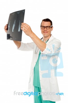 Male Doctor holding X Ray Stock Photo