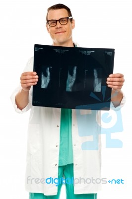 Male Doctor holding X Ray Stock Photo