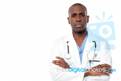 Male Doctor Posing  With Arms Crossed Stock Photo