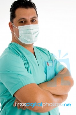 Male Doctor Posing With Face Mask Stock Photo