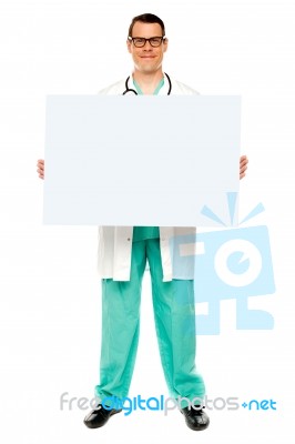 Male Doctor Showing Blank Board Stock Photo