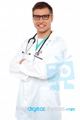 Male Doctor with Arms Crossed Stock Photo