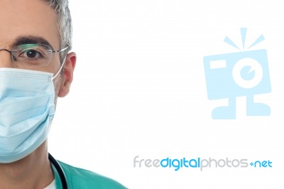 Male Doctor With Face Mask Stock Photo