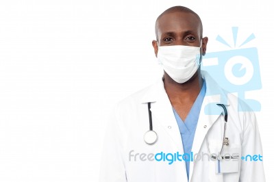 Male Doctor With Face Mask Stock Photo