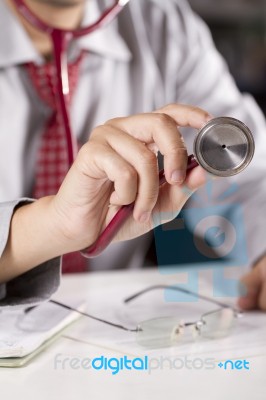 Male Doctor With Stethoscope Stock Photo