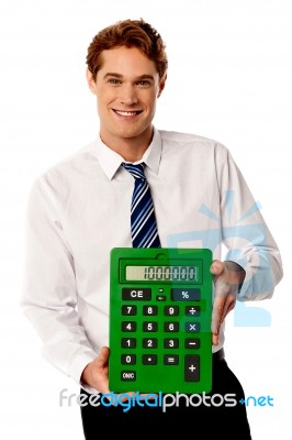 Male Executive With Big Calculator Stock Photo