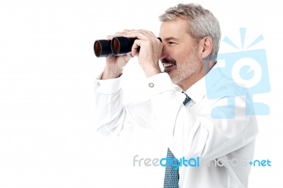 Male Executive With Binocular Stock Photo