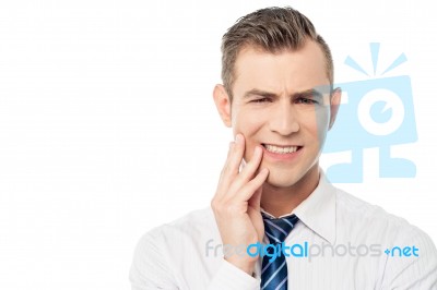 Male Executive With Toothache Stock Photo