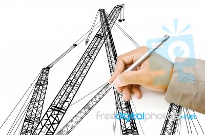 Male Hand Drawing Crane Stock Photo