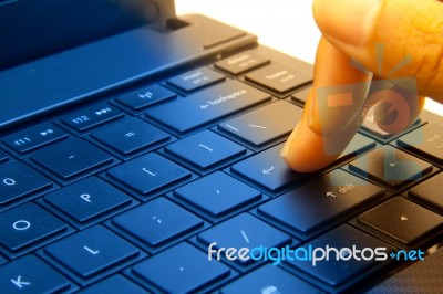 Male Hand Typing On Laptop Stock Photo