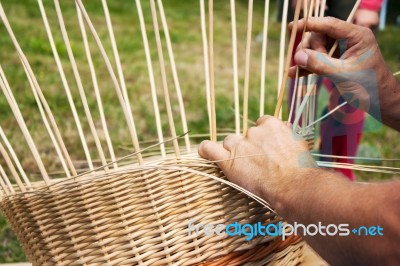 Male Hands Braiding Wicker Basket Stock Photo