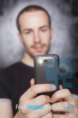 Male Holding Smartphone Stock Photo