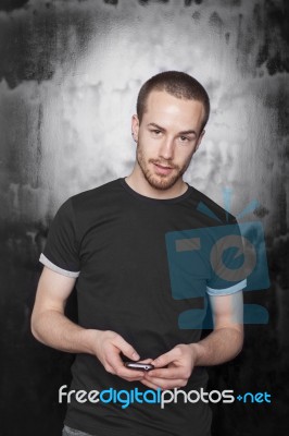 Male Holding Smartphone Stock Photo