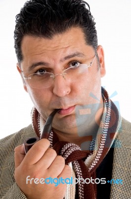 Male Holding Smoking Pipe Stock Photo