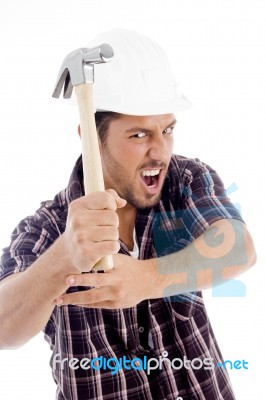 Male In Action With Hammer Stock Photo