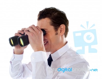 Male Looking Through Binocular Stock Photo