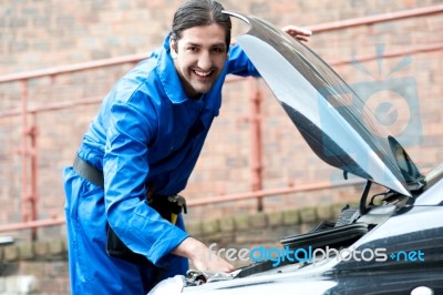 Male Mechanic At Work Stock Photo