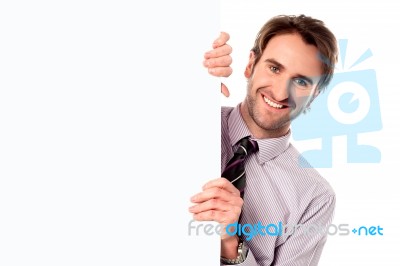 Male Model Holding Blank White Ad Board Stock Photo