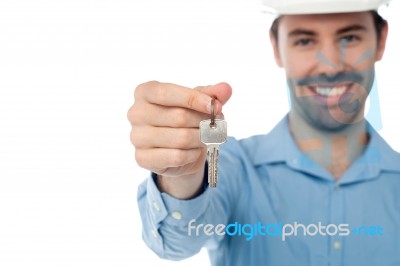 Male Offering You Office Key Stock Photo