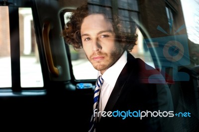 Male Passenger In Rented A Cab Stock Photo