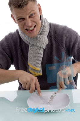 Male Posing With Fork And Knife Stock Photo