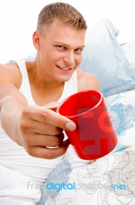 Male Showing Coffee Mug Stock Photo