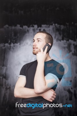 Male Talking Over Phone Stock Photo