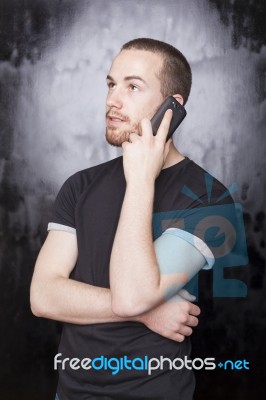 Male talking over phone Stock Photo