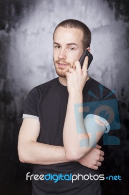 Male talking over phone Stock Photo