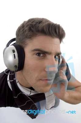 Male With Headphone And Looking At Camera Stock Photo