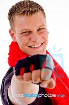 Male With Towel Showing Punch Stock Photo