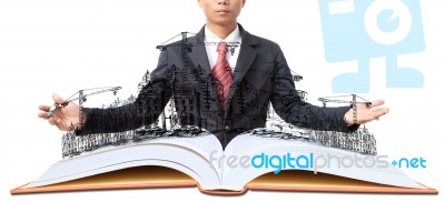 Man And Open Book With Building Construction On White Stock Photo