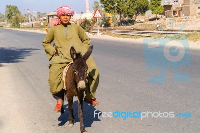 Man And The Donkey Stock Photo