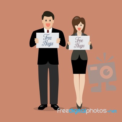 Man And Woman Holding Free Hugs Signs Stock Image