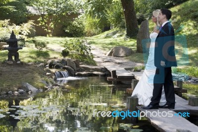 Man And Woman In Japanese Park Stock Photo