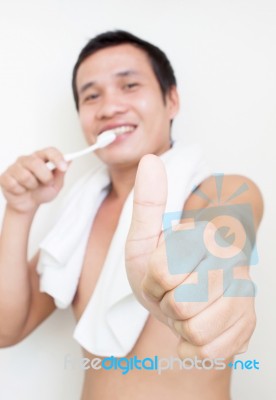 Man Brushing Teeth Stock Photo