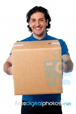 Man Carrying Cardboard Box Stock Photo