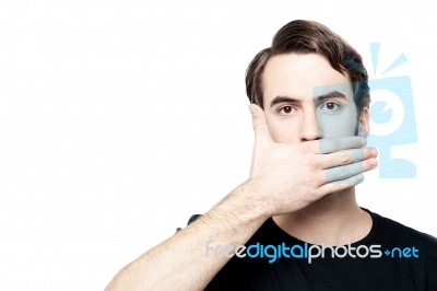 Man Cover His Mouth,  Speak No Evil Concept Stock Photo